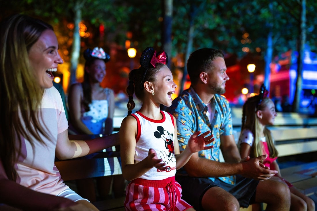 Romantic couple at a magical theme park evening